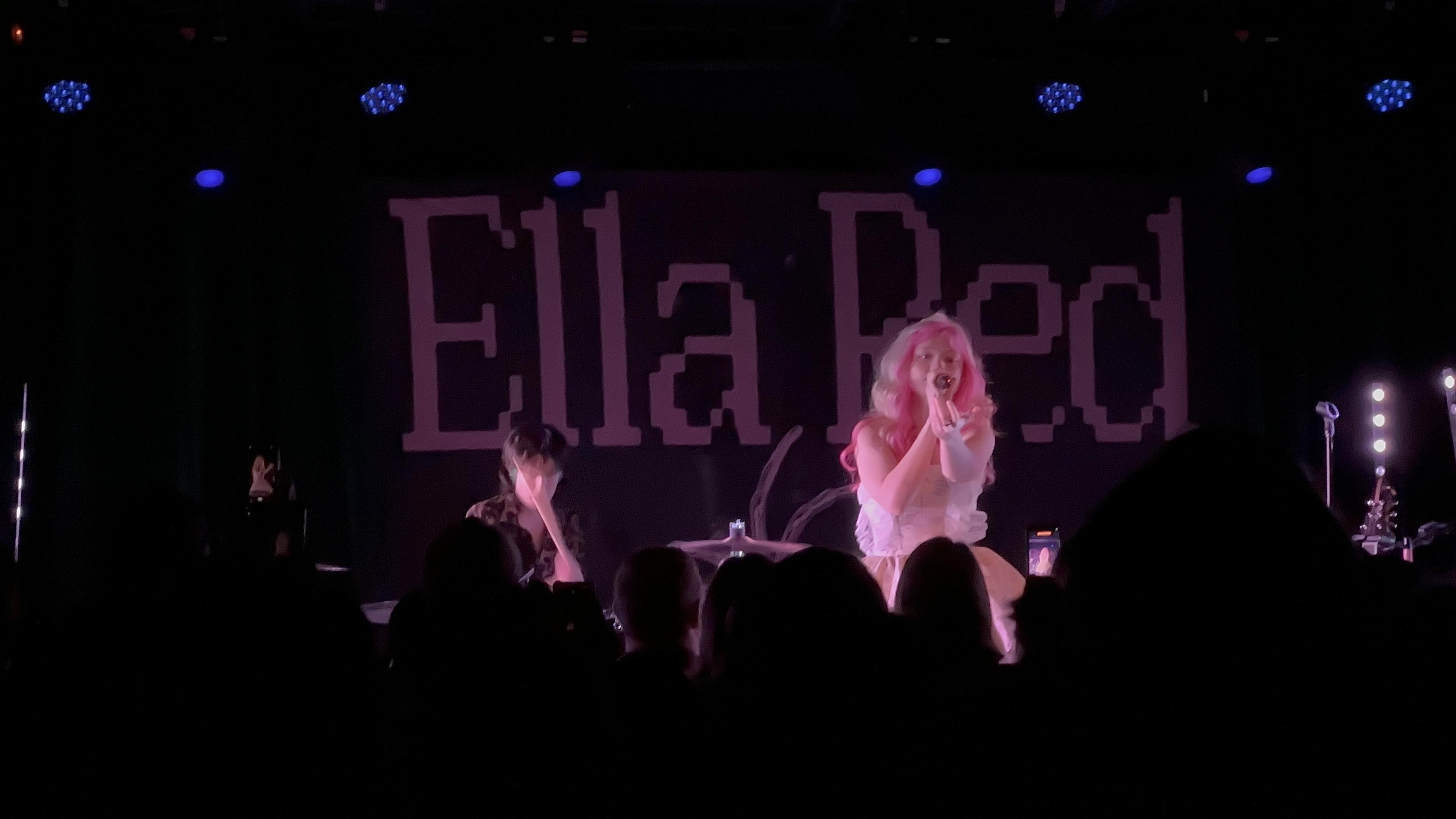 Ella Red on stage with feminine rage